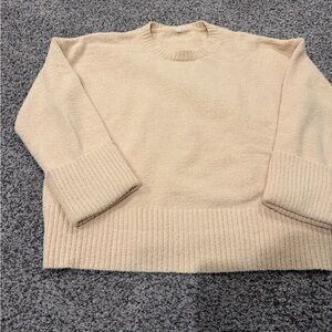 Aranbess Amazon yellow soft sweater. Size small. New without tags.